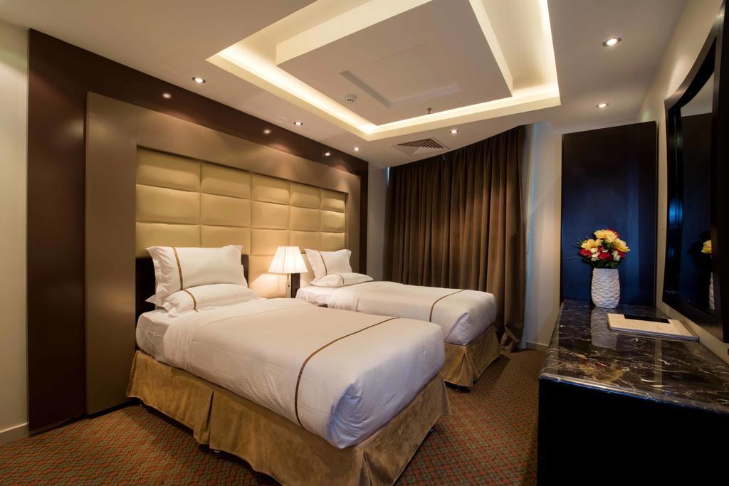 Al Yamama Palace Hotel Suites Рияд Стая снимка